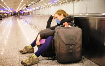 Traveler waiting for delayed flight.