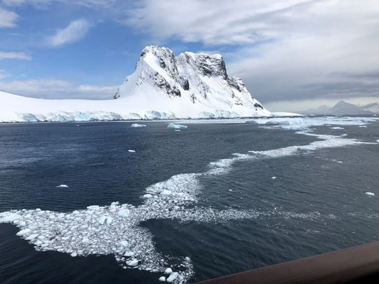 icy waters, snowy peaks