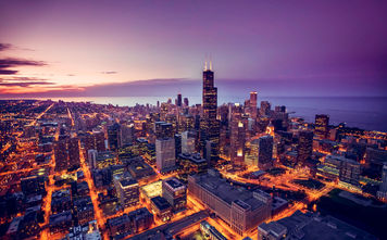 Chicago skyline aerial view at dusk, United States (Photo via  marchello74 / iStock / Getty Images Plus)