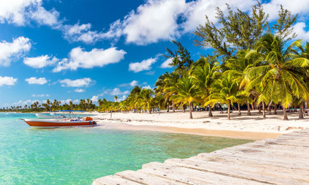 Beautiful caribbean beach on Saona island, Dominican Republic (photo via czekma13 / iStock / Getty Images Plus)