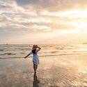 Summer traveler enjoying the beach