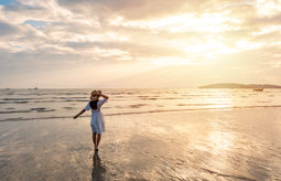 Summer traveler enjoying the beach