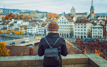 Traveler backpacking through Zurich, Switzerland