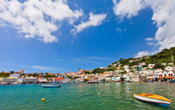 View of Carenage, St. George in the capital city of Grenada (photo via Flavio Vallenari/iStock/Getty Images Plus)