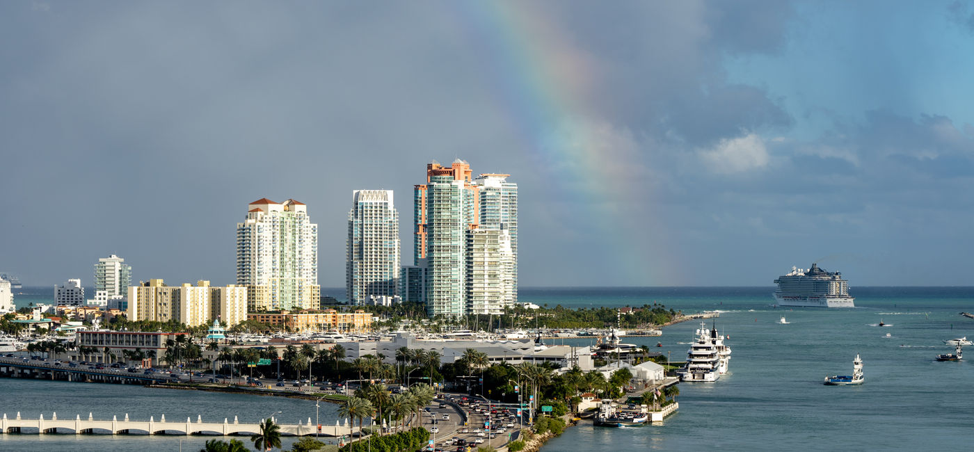 Image: A rainbow stretches over Fort Lauderdale, Florida. (Photo Credit: Adobe Stock/Isaac Gindi)