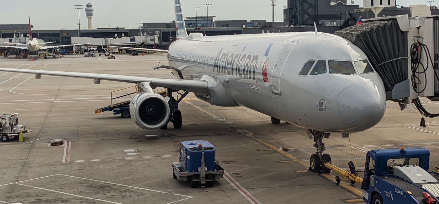 Image: American Airlines plane at airport gate. (photo by Eric Bowman)