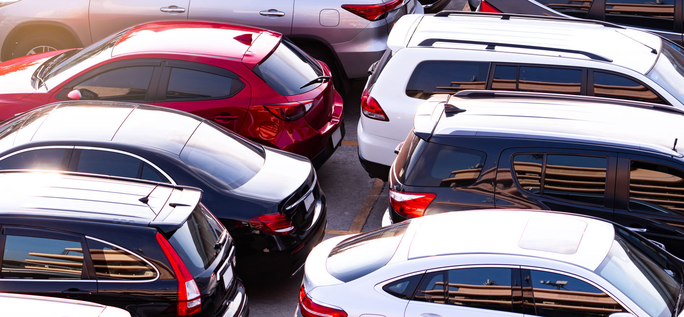 Image: Car rental lot. (Photo Credit: Artinun/Adobe)