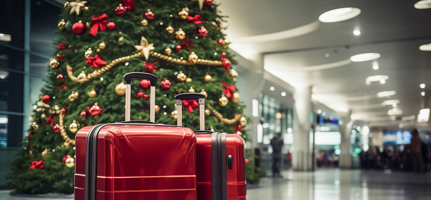 Image: Christmas at the airport (Photo Credit: Slepitssskaya, Adobe Stock)