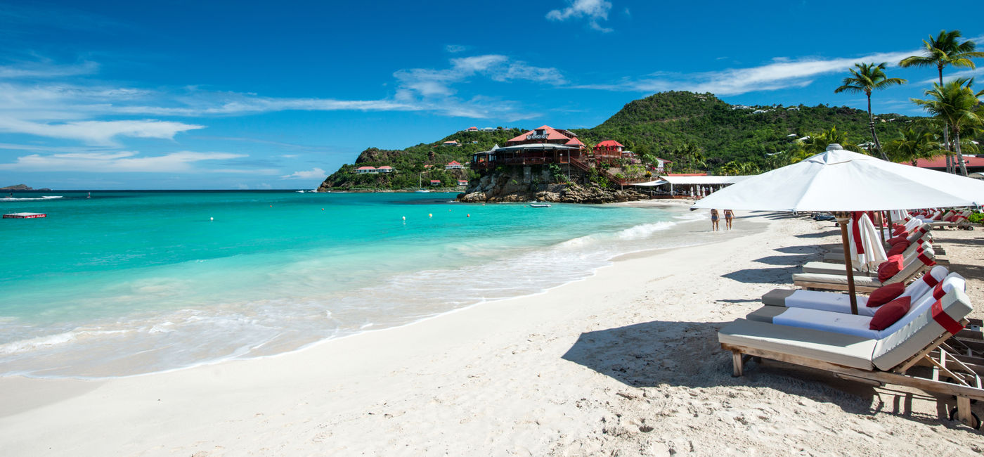 Image: French island in a Caribbean sea (photo via daniloforcellini / iStock / Getty Images Plus)