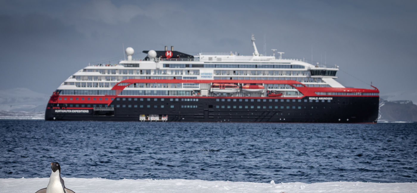 Image: Hurtigruten's MS Roald Amundsen in Duse Bay, Antarctica. (photo via Oscar Farrera / Hurtigruten Expeditions) (Photo Credit: (photo via Oscar Farrera / Hurtigruten Expeditions))