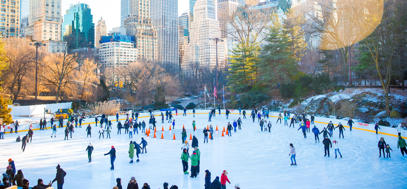 Image: People ice skating in Central Park, New York City. (Photo Credit: travnikovstudio/Adobe)