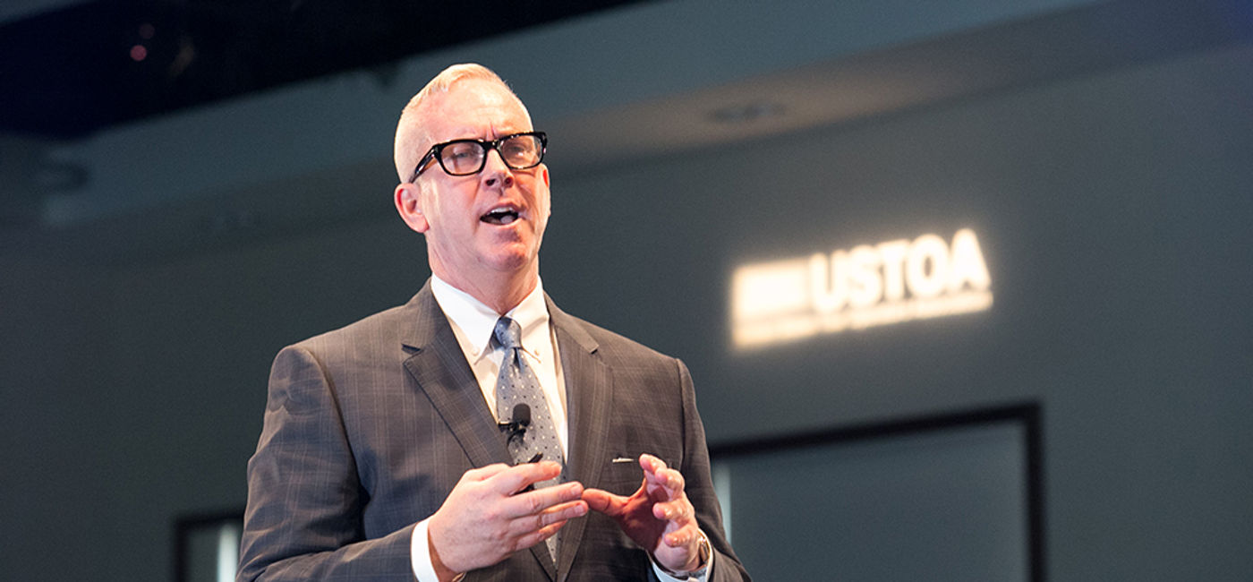 Image: PHOTO: Terry Dale speaking at USTOA in Scottsdale (photo courtesy USTOA)