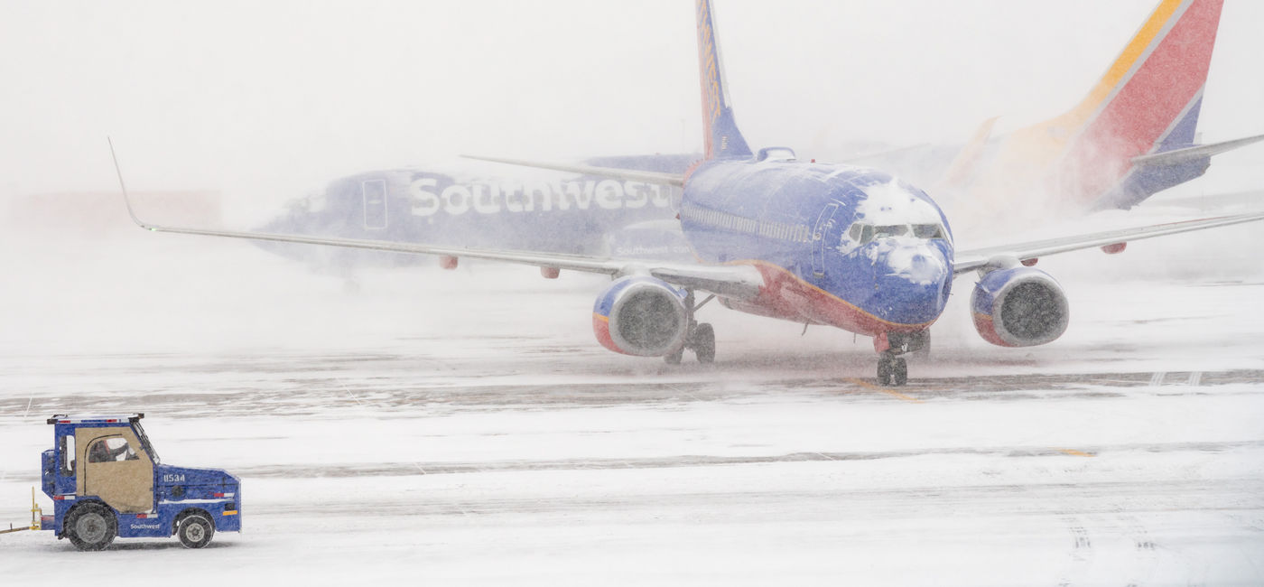 Image: Southwest Airlines taxi on a snowy runway. (Photo Credit: steheap/Adobe)