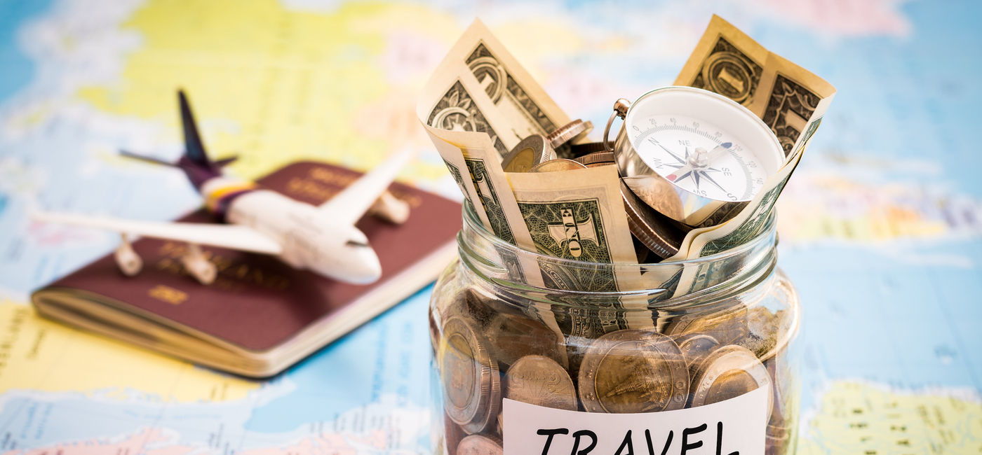 Image: Travel savings. (Photo Credit: Adobe Stock/surasaki)