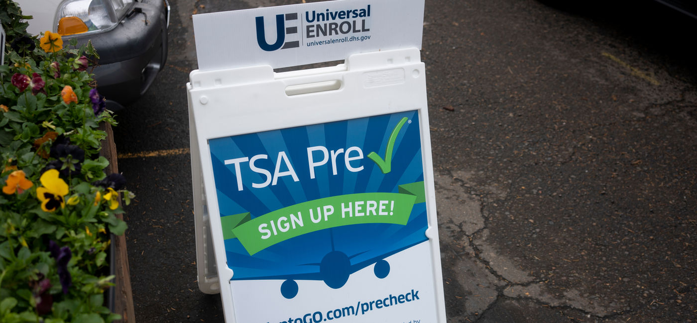 Image: TSA PreCheck enrollment service. (Photo Credit: Tada Images - stock.adobe.com)