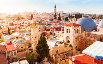 Old City of Jerusalem with the aerial view. View of the Church of the Holy Sepulchre, Israel. (Photo via seregalsv / iStock / Getty Images Plus)