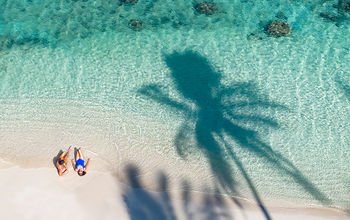 A couple at a lagoon on Moorea