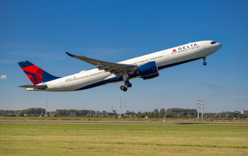 Delta Air Lines plane taking off from Amsterdam's Schiphol Airport