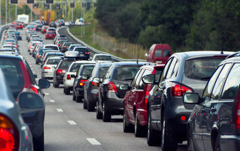 Traffic jam with rows of cars.