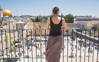 Women looks on at Jerusalem old city, Israel