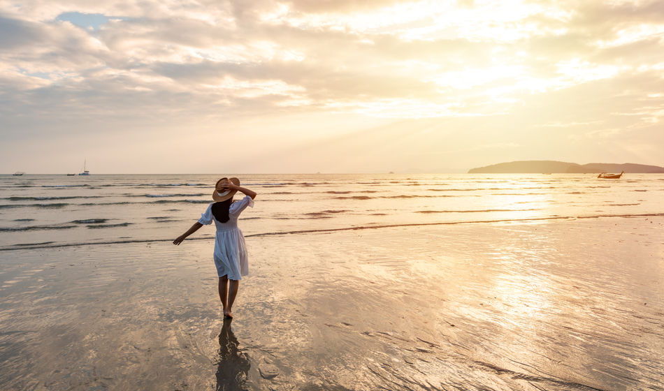 Summer traveler enjoying the beach