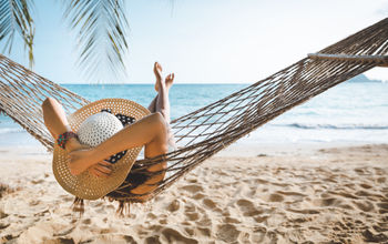 Summer traveler relaxing on the beach